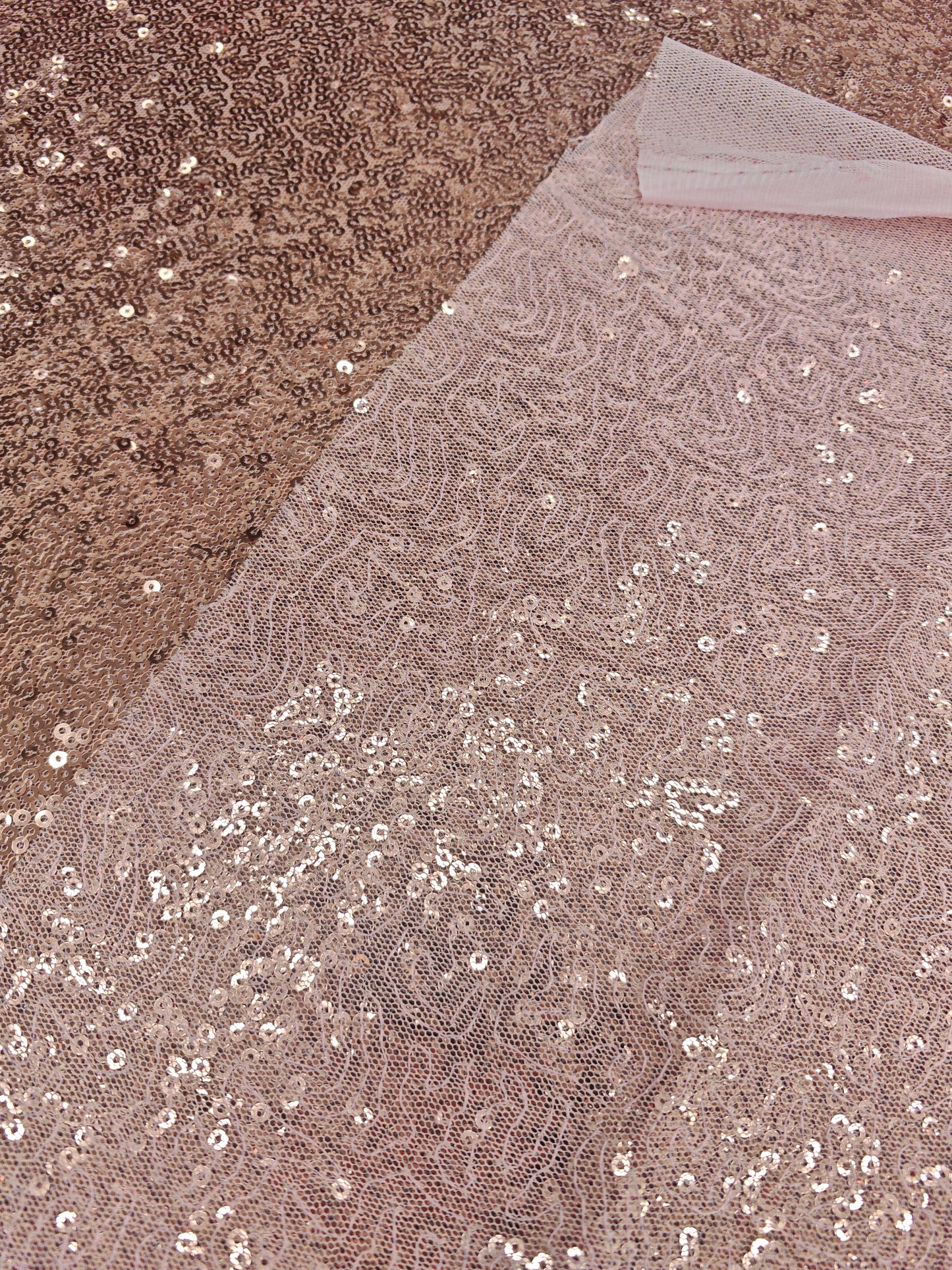 ROSE GOLD SEQUIN FABRIC – SEWN SEQUINS ON MESH – 144cm WIDE