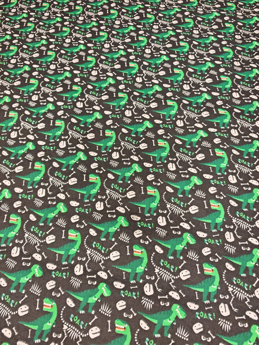 DINO BONES – BLACK & GREEN POLYCOTTON WINCEYETTE – 80% COTTON / 20% POLYESTER – 108cm WIDE