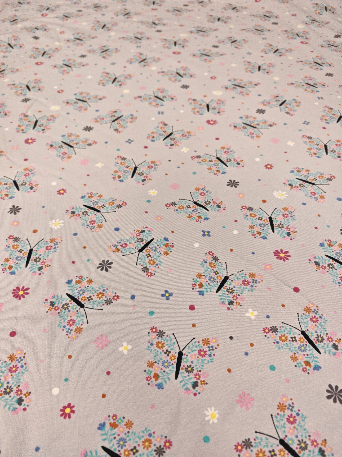 FLORAL BUTTERFLIES – COTTON JERSEY FABRIC – 143cm WIDE – 95% COTTON 5% ELASTANE