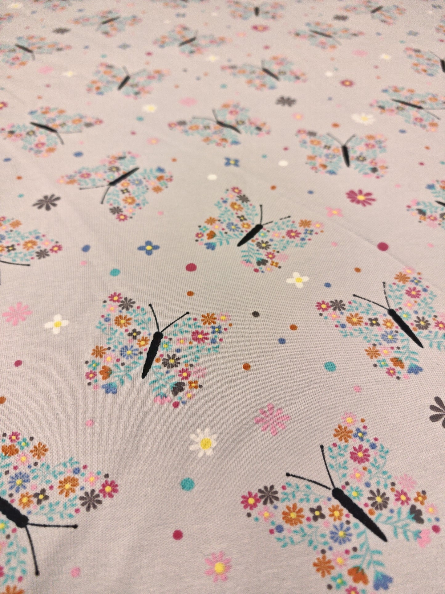 FLORAL BUTTERFLIES – COTTON JERSEY FABRIC – 143cm WIDE – 95% COTTON 5% ELASTANE