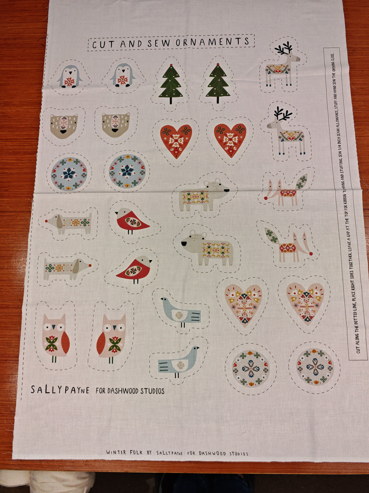 WINTER FOLK CUT & SEW CHRISTMAS ORNAMENT PANEL – SALLY PAYNE FOR DASHWOOD STUDIO – 100% COTTON – MAKES 14 ORNAMENTS
